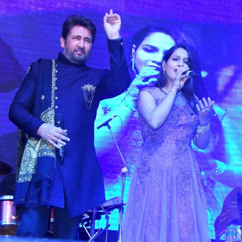 Kkomal Krusshna performing at concert venue